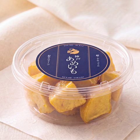 神戸あめいものパッケージ。紺色のラベルに「神戸あめいも」の文字